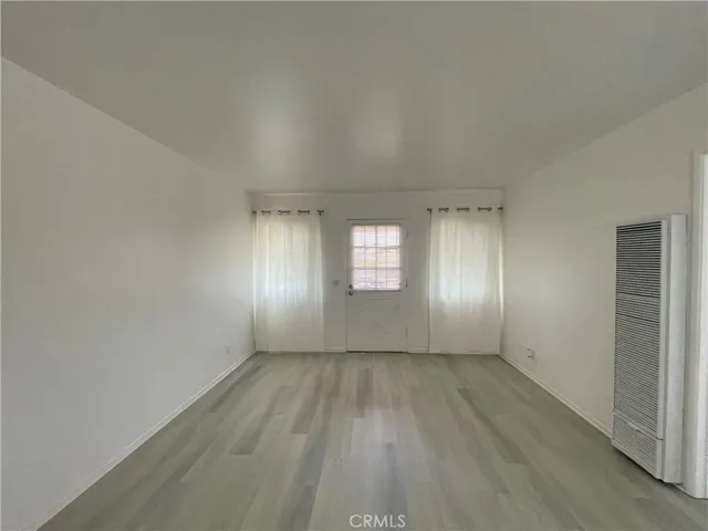 Main Entrance to Living Room and Dining Area