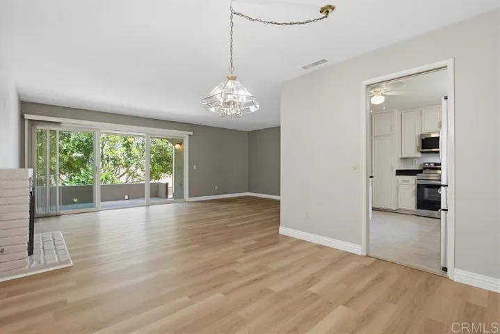 Living Room and Dining Room Combo - Original Photo. See Virtually Staged Photo too