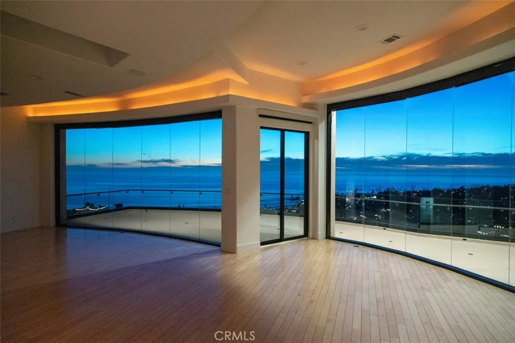 Upstaris Living Room, Dinning Room overlooking the terrace with amazing Ocean and City Light views