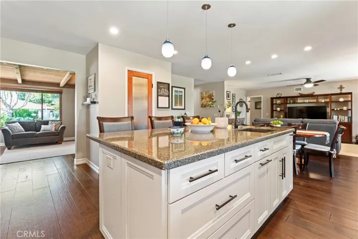 Kitchen Island, Walk-in Pantry and Open to Family and Living Rooms