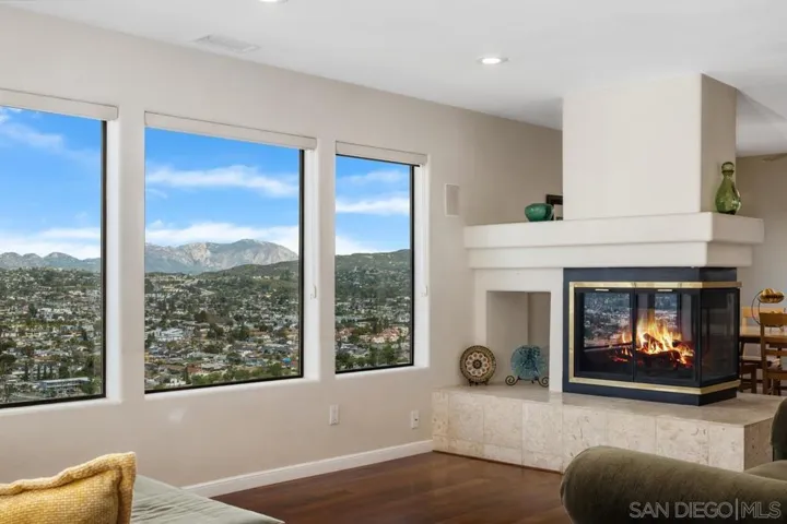 Fire in the fireplace.  https://zimg.paragon.ice.com/ParagonImages/Property/PA/SDMLS/-516564/55/533/400/3962436048ddb1e864ab5a5e79ed05a7/3/0efa2bb60f4d4e82ae083b9455715dfd/-516564-417e260e-3802-4f90-9a67-2db50f0d5102.JPG