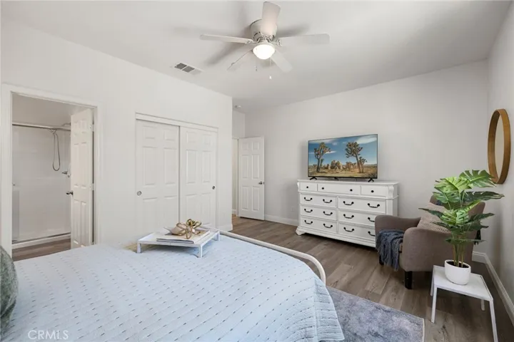 Main floor bedroom with attached full bath