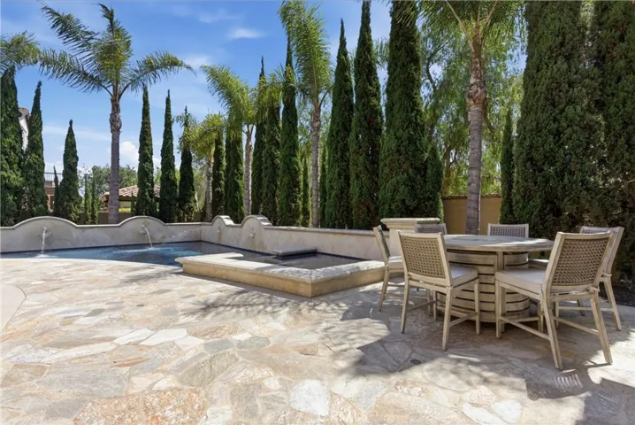 Spacious entertaining patio with resort-inspired ambiance and privacy