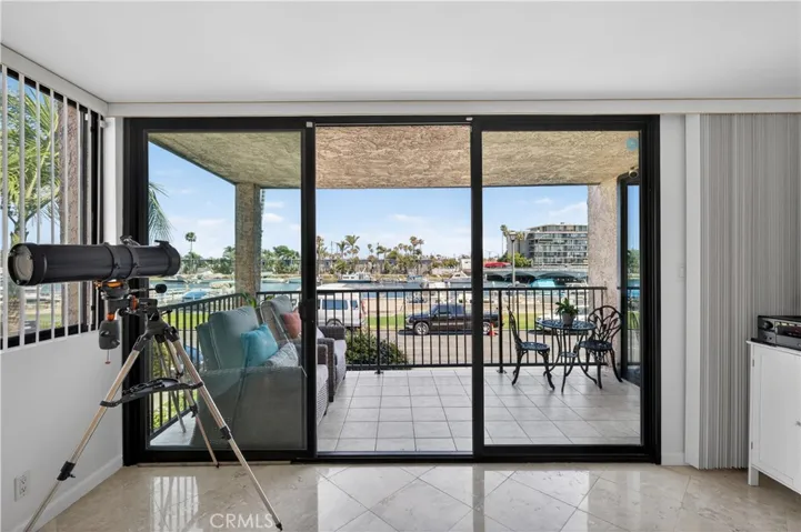 Private, covered patio is one of two outdoor spaces for this unit.