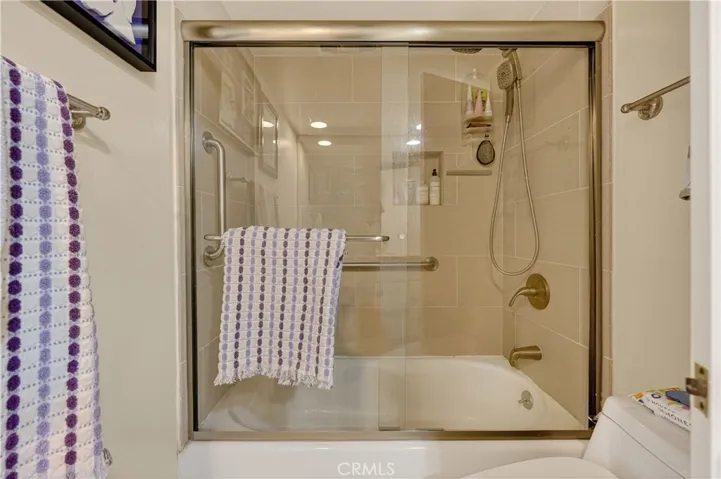 Primary bathroom with a tub/shower combo.