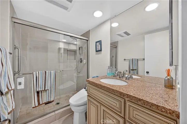 Guest bathroom with walk-in shower.
