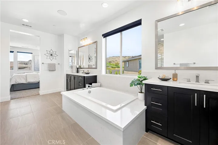 Primary bath with separate tub and shower