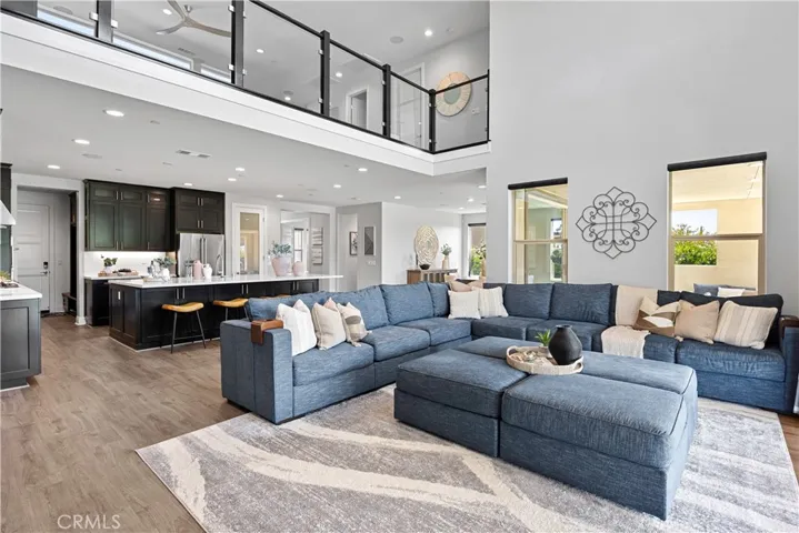 Open floor plan with dramatic two-story spaces