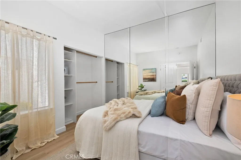 Thoughtfully designed for comfort, the secondary bedroom serves as a private guest retreat, creating an inviting space for friends and family.