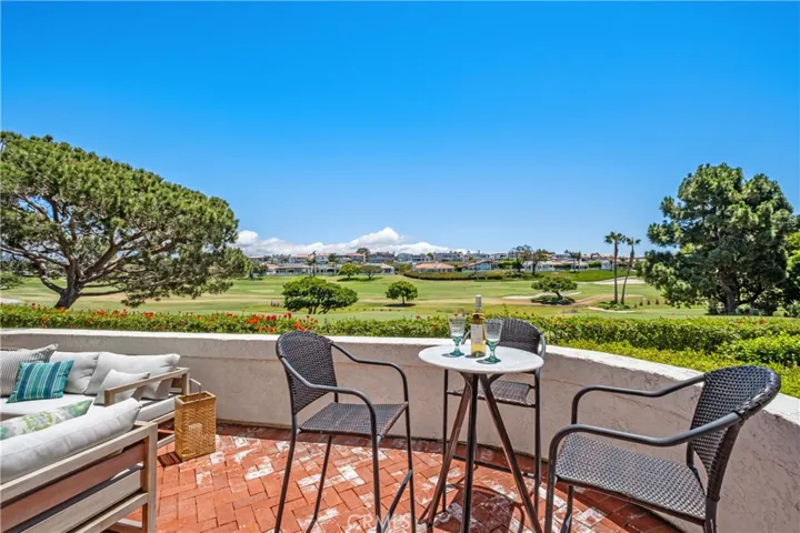 Outdoor patio is perfectly positioned to capture gorgeous golf course views.