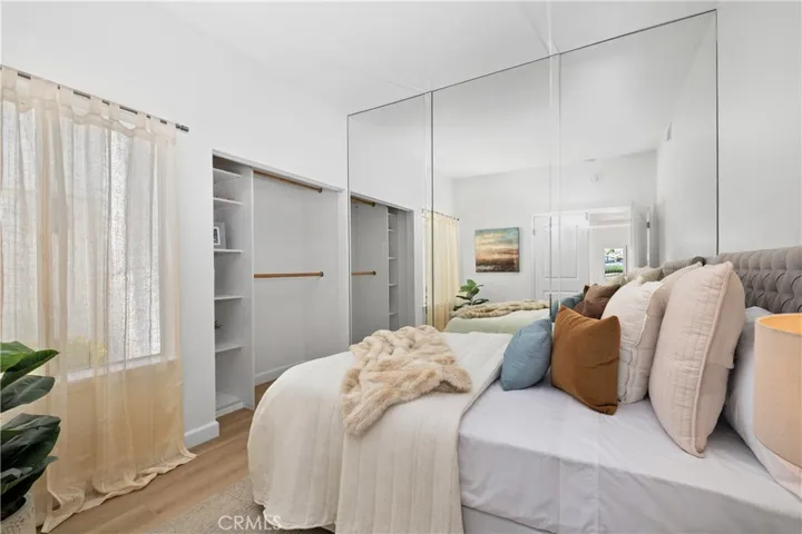 Thoughtfully designed for comfort, the secondary bedroom serves as a private guest retreat, creating an inviting space for friends and family.