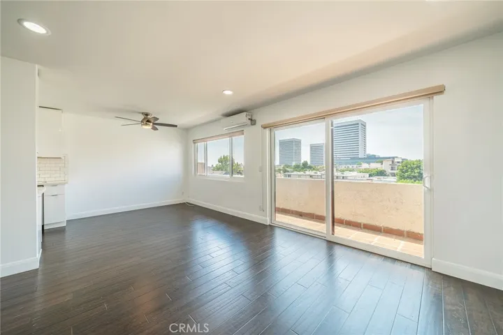 View from the front door of #302 to dining area and balcony