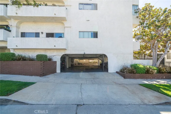 Side entrance to the gated garage parking from Massachusetts Ave.