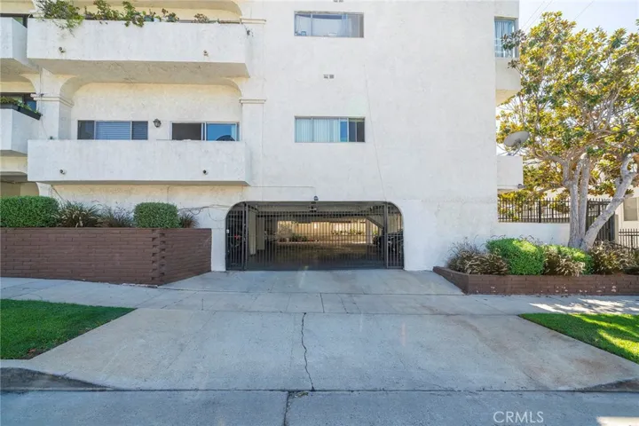 Side entrance to the gated garage parking from Massachusetts Ave.