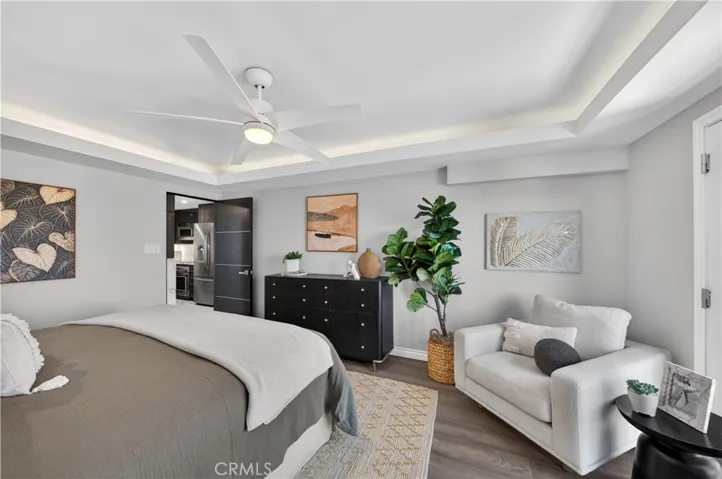 Primary suite is very spacious with room for a dresser and lounge area.
