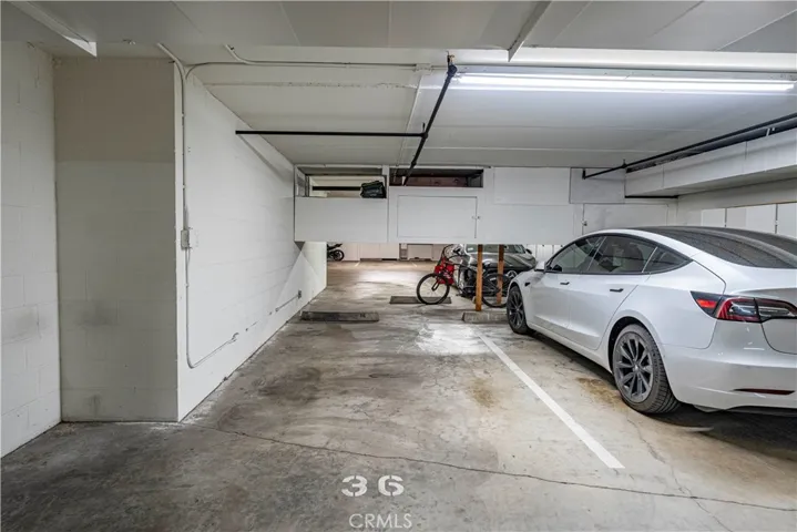 Parking spot #36 with storage cabinet.
