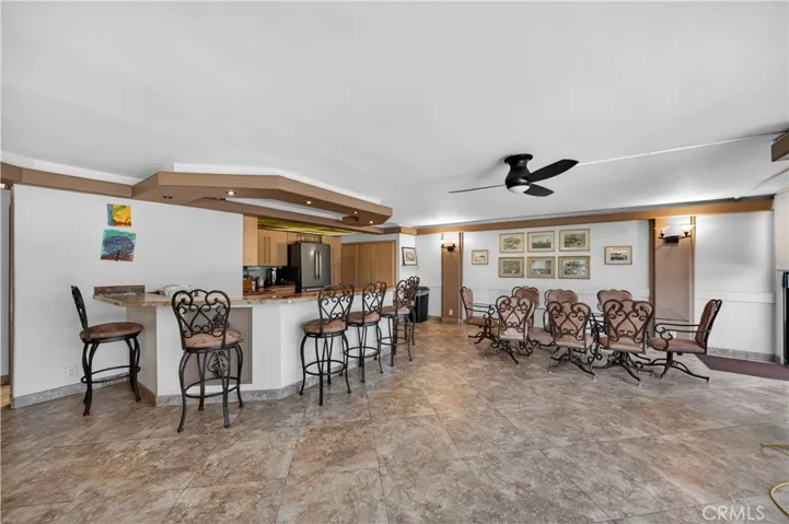 Community room offers a kitchen and dining area.