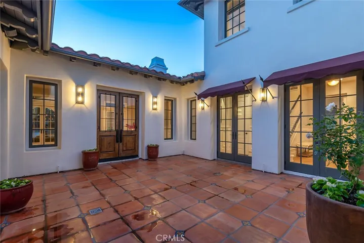 Gated front courtyard entry