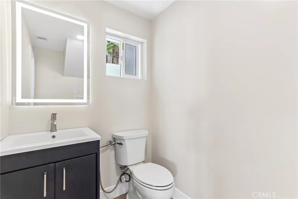 ADU downstairs half bath with storage closet not pictured