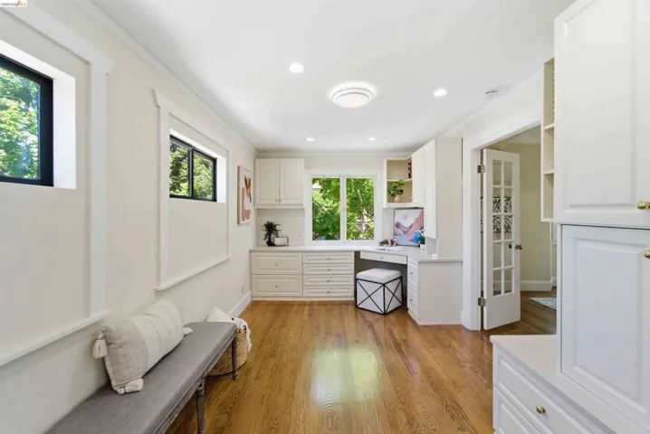 Custom built-in desk and cabinetry with ample storage
