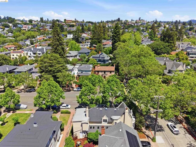 Residential neighborhood featuring mature trees and established homes