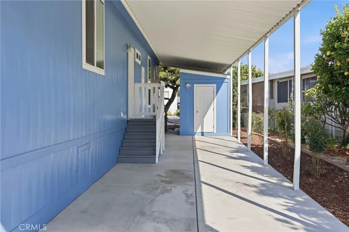 COVERED CARPORT AND SHED