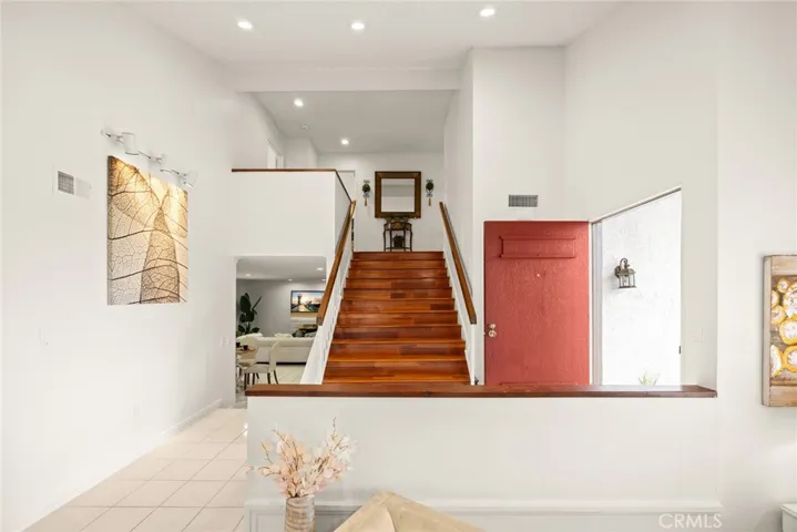 Formal entry with beautiful red door