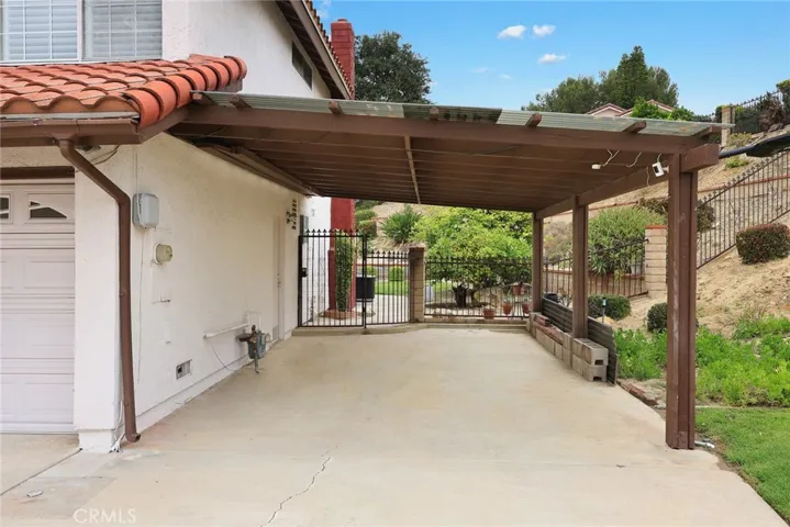 Large covered side carport