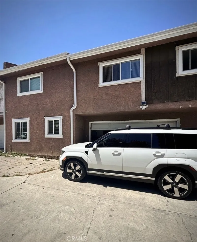 Attached Garage with 2 Car Driveway Parking