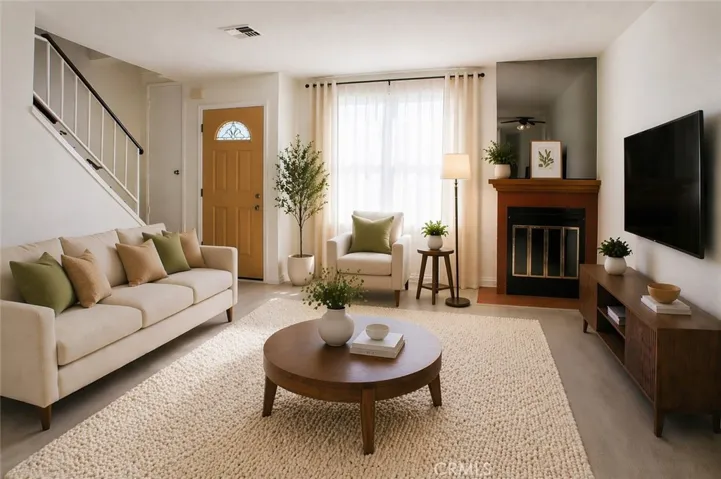Living Room With Fireplace (Digitally staged)
