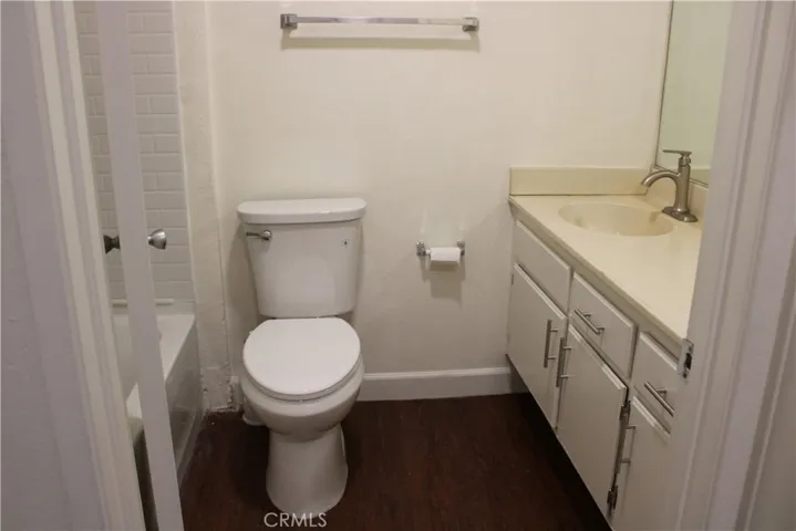 Upstairs Hallway Bathroom with new tub, fixtures, and toilet