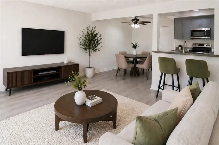 Living Room and Dining Area (Digitally staged)