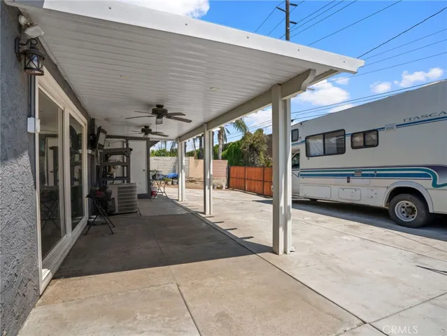 Newer Aluminum Patio Cover with ceiling fans/lights.