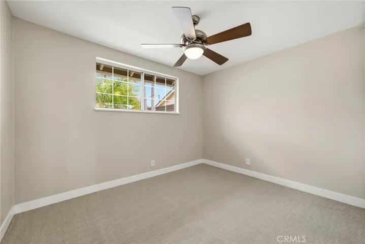 Secondary bedroom BEFORE virtual staging.