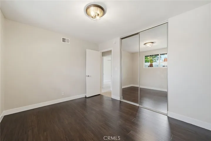 Secondary bedroom with a clean layout and comfortable proportions.