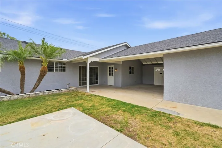 Backyard setting offering privacy, comfort, and practical use.