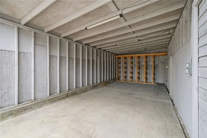 Covered storage area designed for recreational vehicles, boats, or toys.