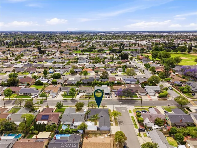 Overhead view emphasizing the property’s lot size, driveway, and outdoor areas.