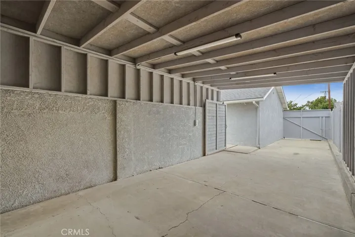 HUGE covered parking area ideal for RV, boat, or toy storage.