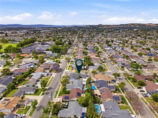 Aerial view highlighting the spacious corner lot and surrounding neighborhood.