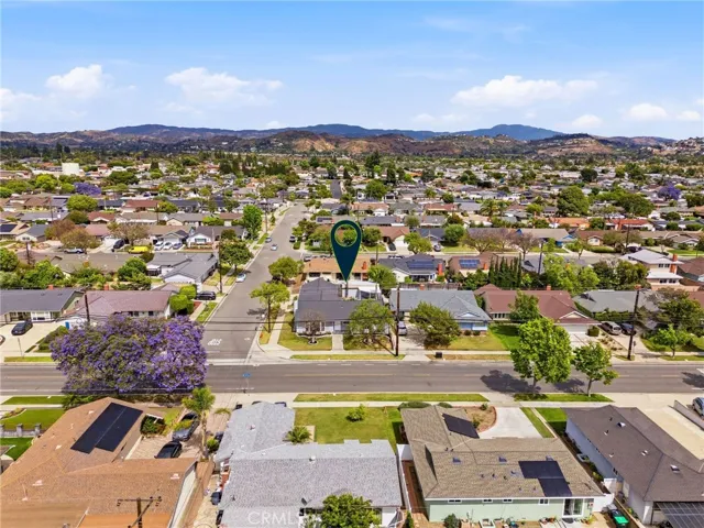 Aerial view capturing the home’s corner lot and surrounding streets.