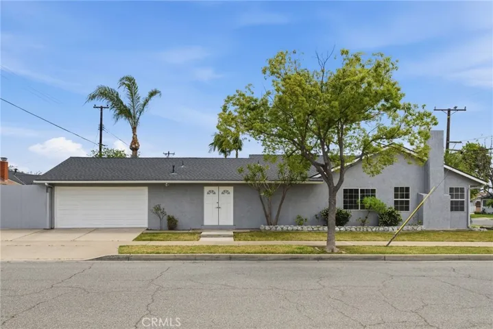Single-story home positioned on a spacious corner lot in Orange.