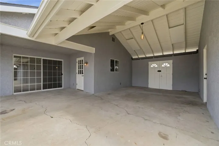Sliding doors create an easy connection between the interior living space and the backyard.