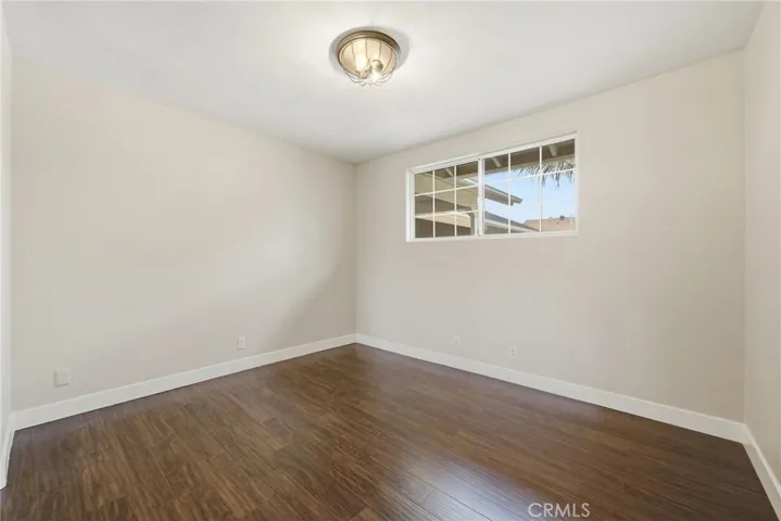 Secondary bedroom BEFORE virtual staging.