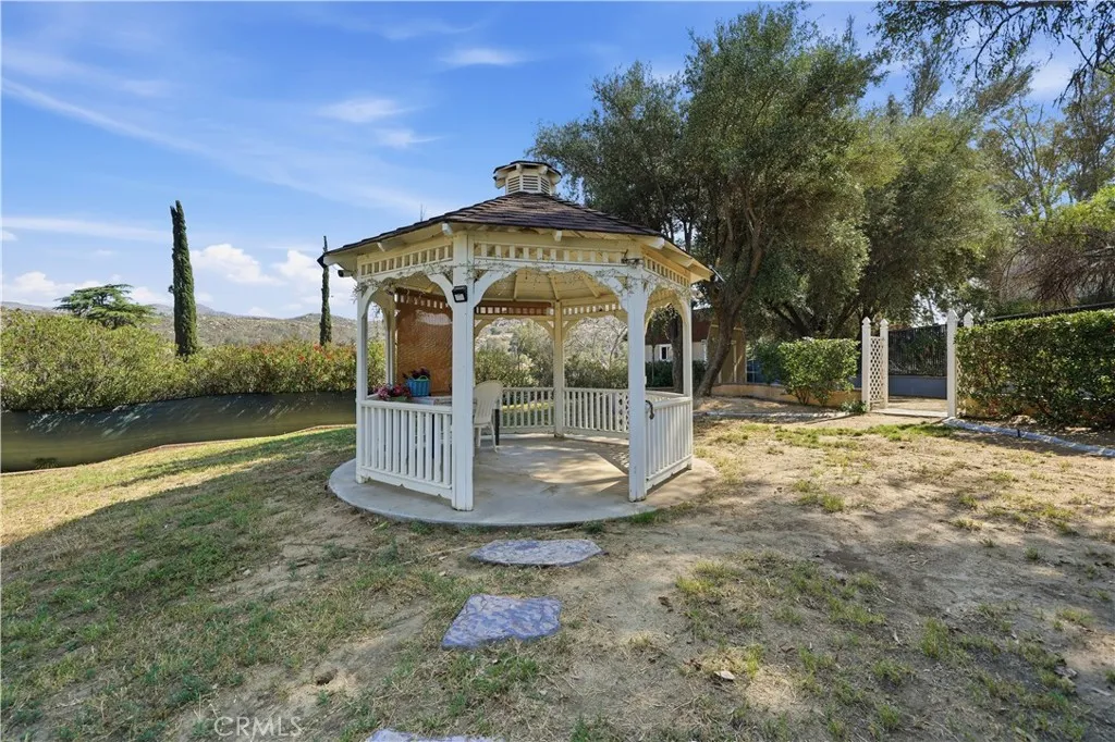 Victorian style gazebo with electricity sits on the knoll.