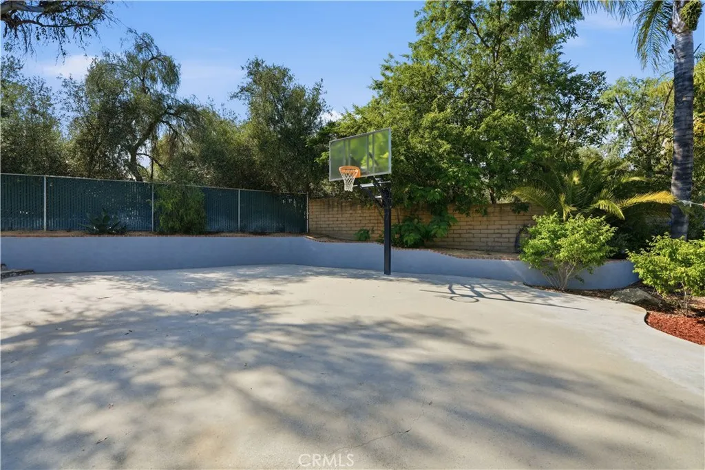 Private backyard with basketball court