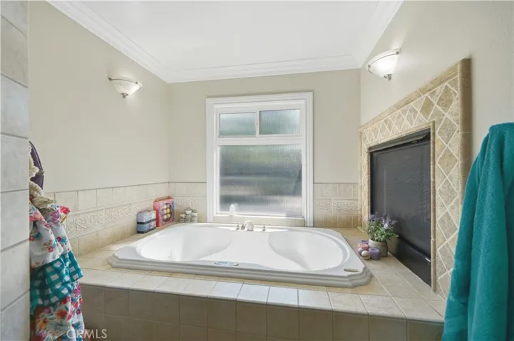 Jetted tub with fireplace