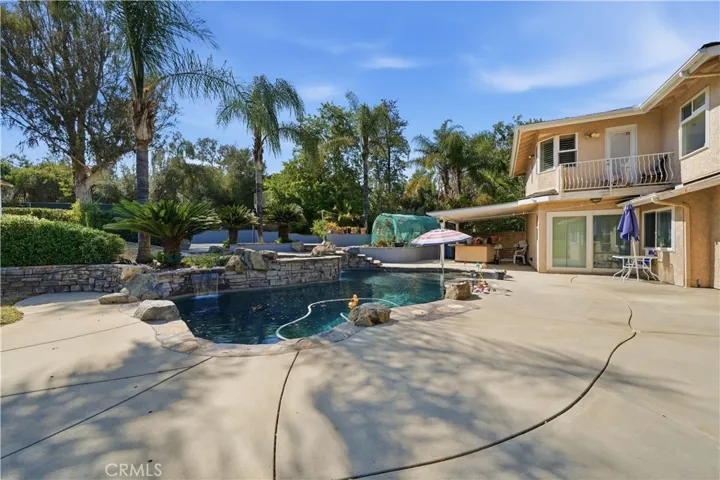 Featuring spillways cascading into the pool