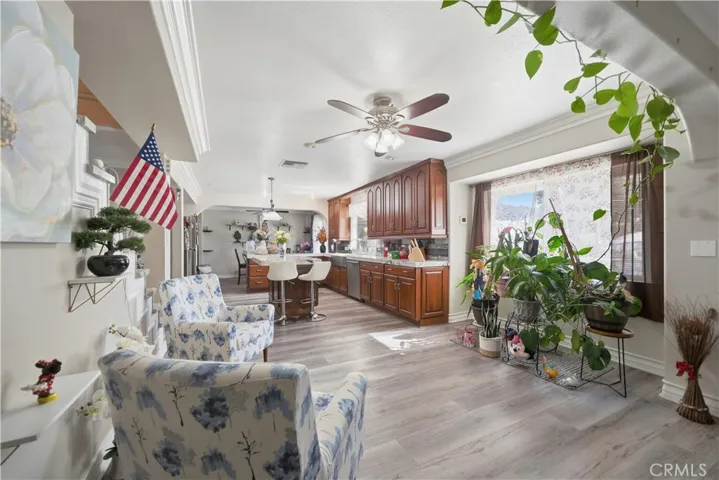 Great natural light fills the space and offers a view of the pool and backyard through the large picture window.