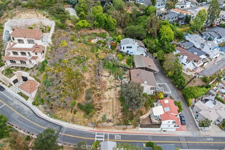 Build your own custom home in an already established neighborhood. Views, plans and an active permit.  Please note, this image shows two lots. Lot for sale is closest to the ocean. Fencing in front shows the lot for sale.